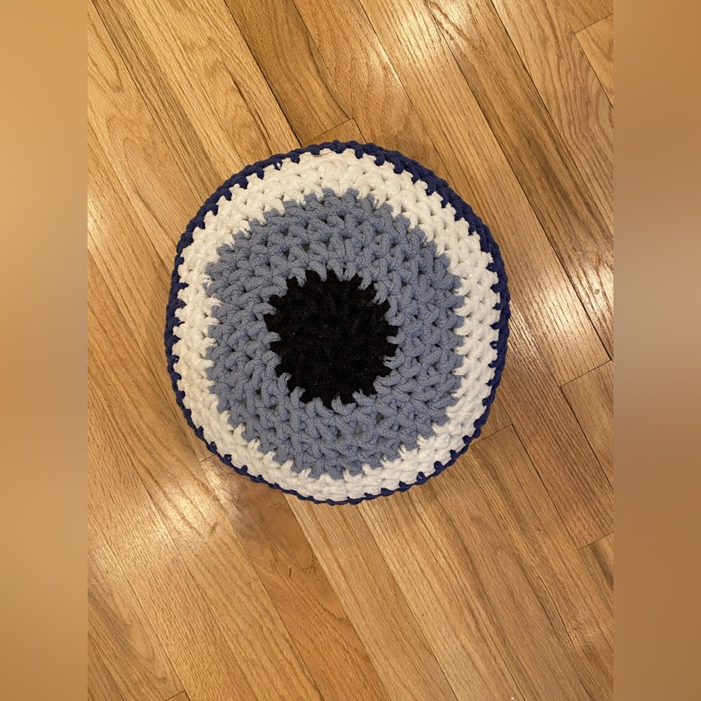Evil eye crotchet throw pillow